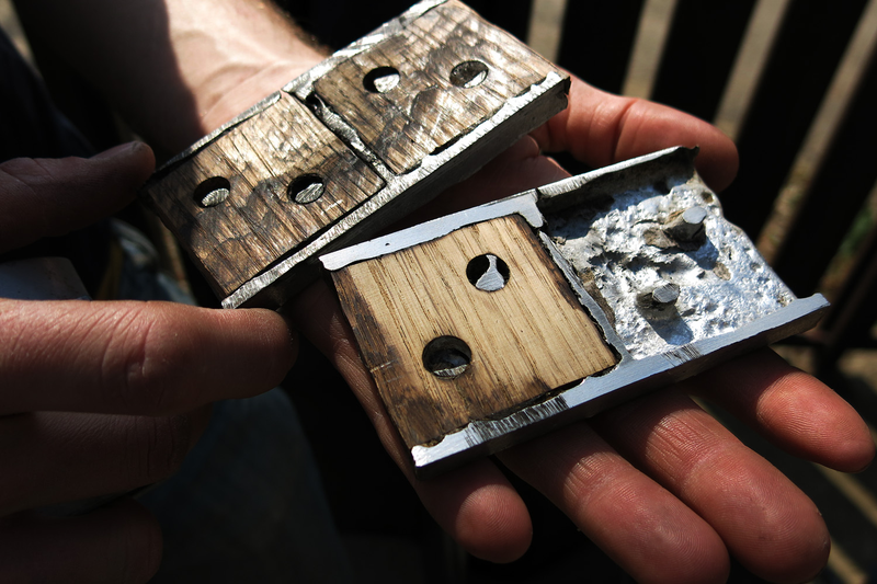 Illustration for article titled Casting Molten Metal On Wood With a Hungarian Design Master